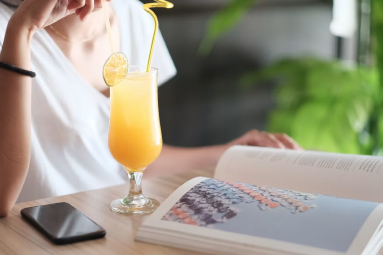 mimosa glass with orange garnish