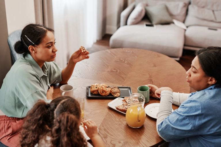 family sharing breakfast at a table